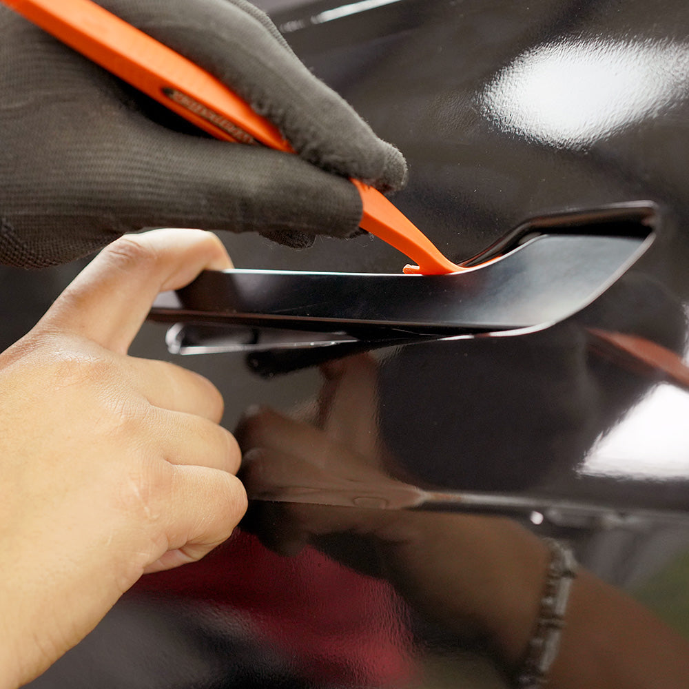 Use wrap sticks provided to fold tight corners in.